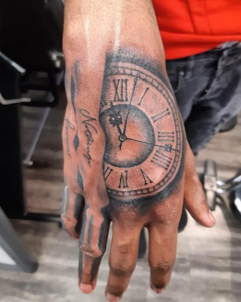 Exquizeet Tattoo & Piercing Studio